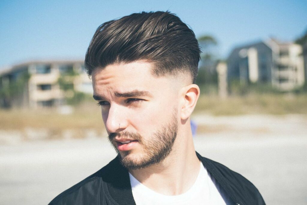 Long hair on top with fade